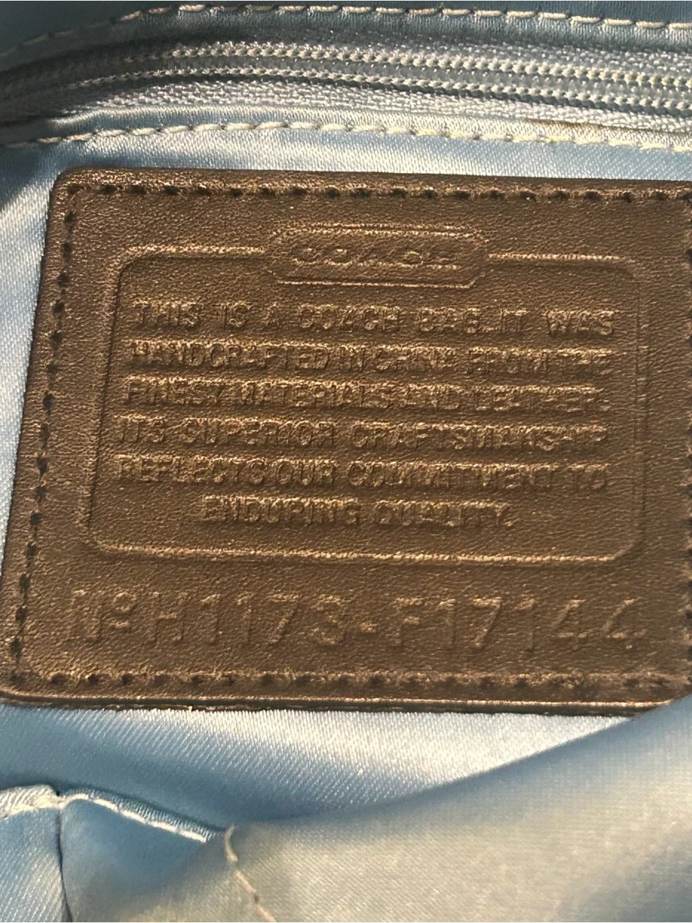 Coach sleek black